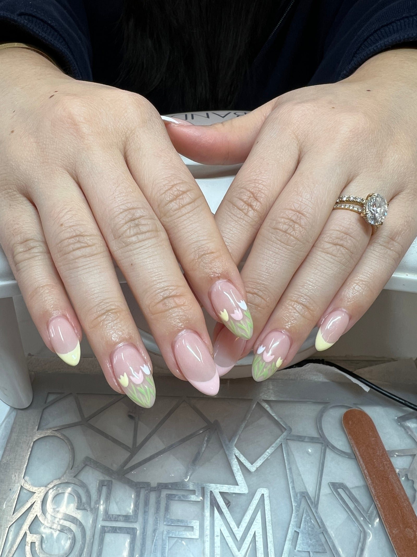 Almond gel manicure with soft lime and peach French tips